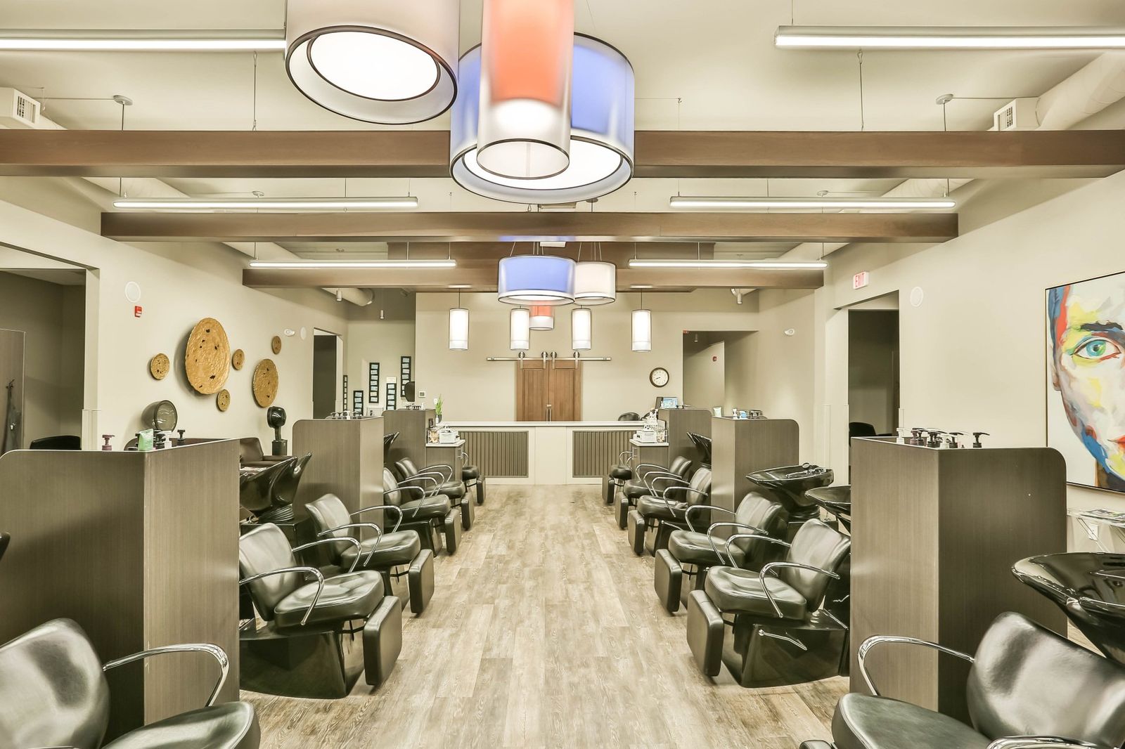 Guest with finished hairstyle at Hair Success Salon Fargo