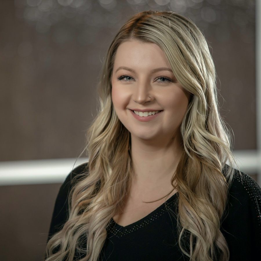 Representative photo of a Hair Success salon stylist at work in Fargo, ND